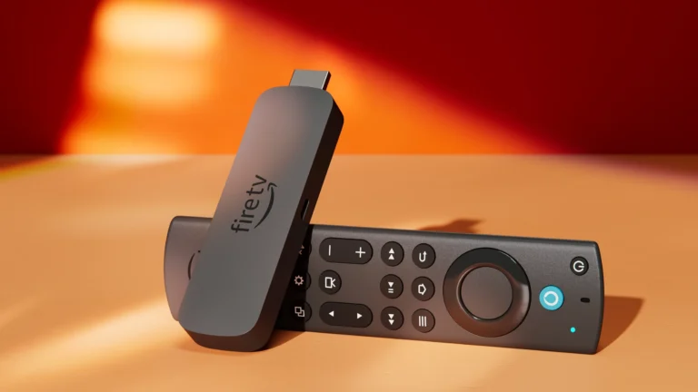 Fire TV Stick and remote on a table – used for installing IPTV Smarters Pro on Firestick (Complete Setup Guide 2025)