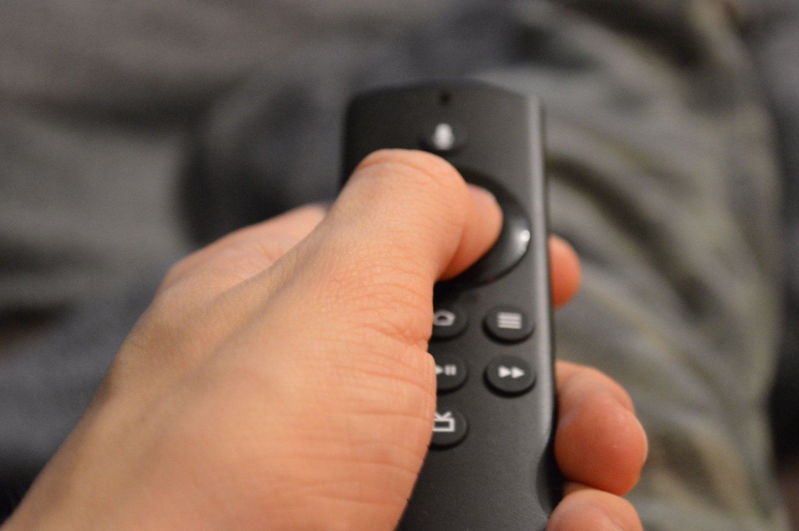 Viewer testing streams with a TV remote during an IPTV trial