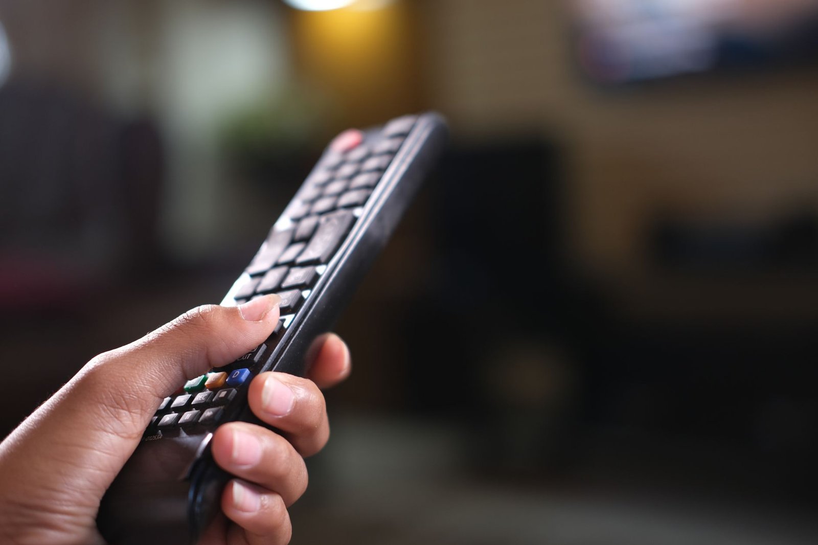 Changing channels with a remote to check which IPTV channels have no sound