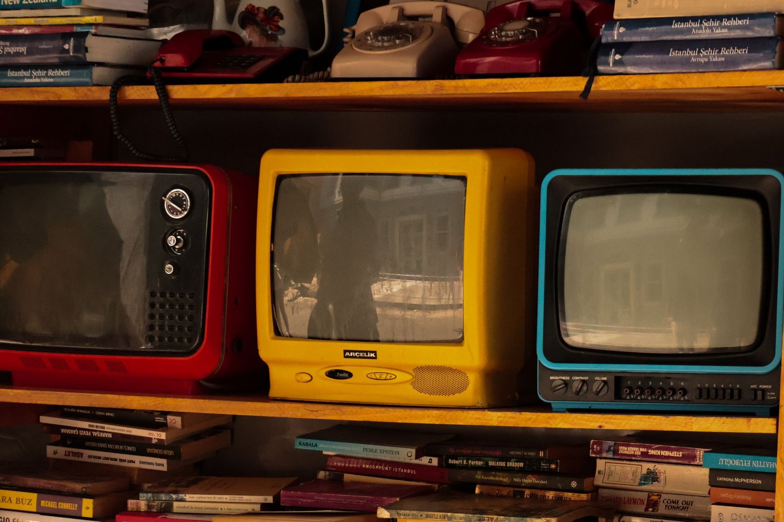 Set-top box under a TV, the kind of device whose IPTV activation is tied to one box